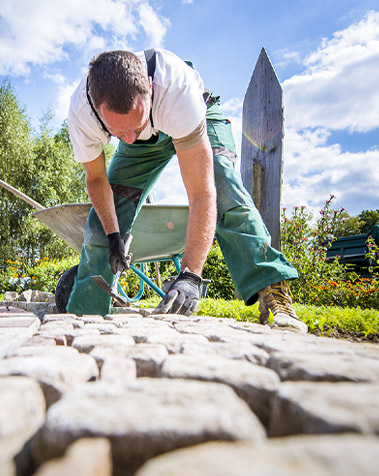 Man Laying Stones